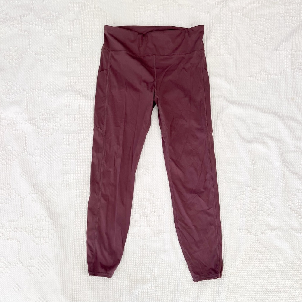 Vuori Stride Leggings in Chestnut Large? Pocket